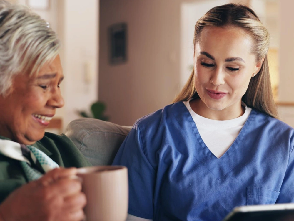 A Thrive On Care nurse helps a patient in San Antonio with personal hygiene tasks.