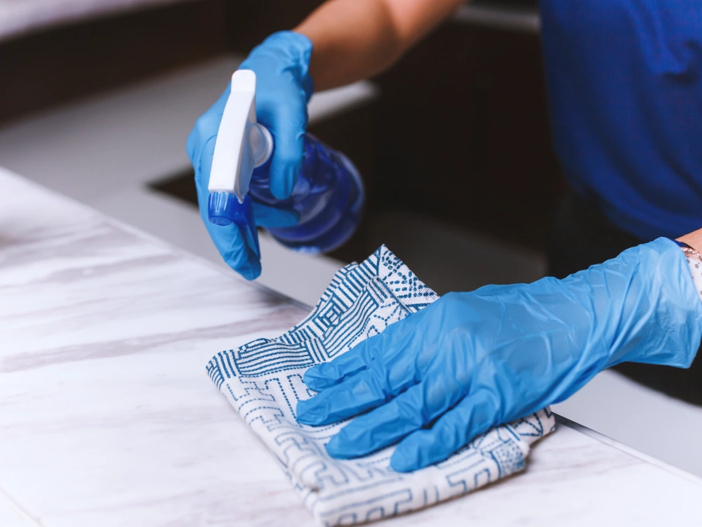 A Thrive On Care caregiver assists by organizing medical equipment and supplies.