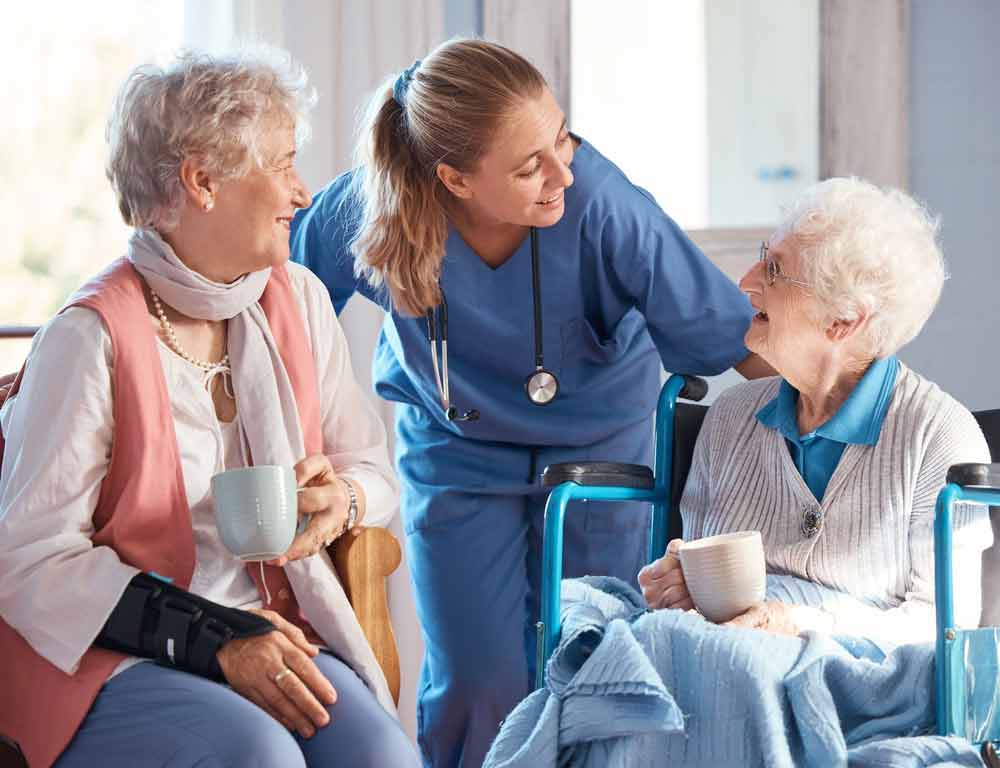 Thrive On Care supports social engagement as women spend time in blue and pink dresses.