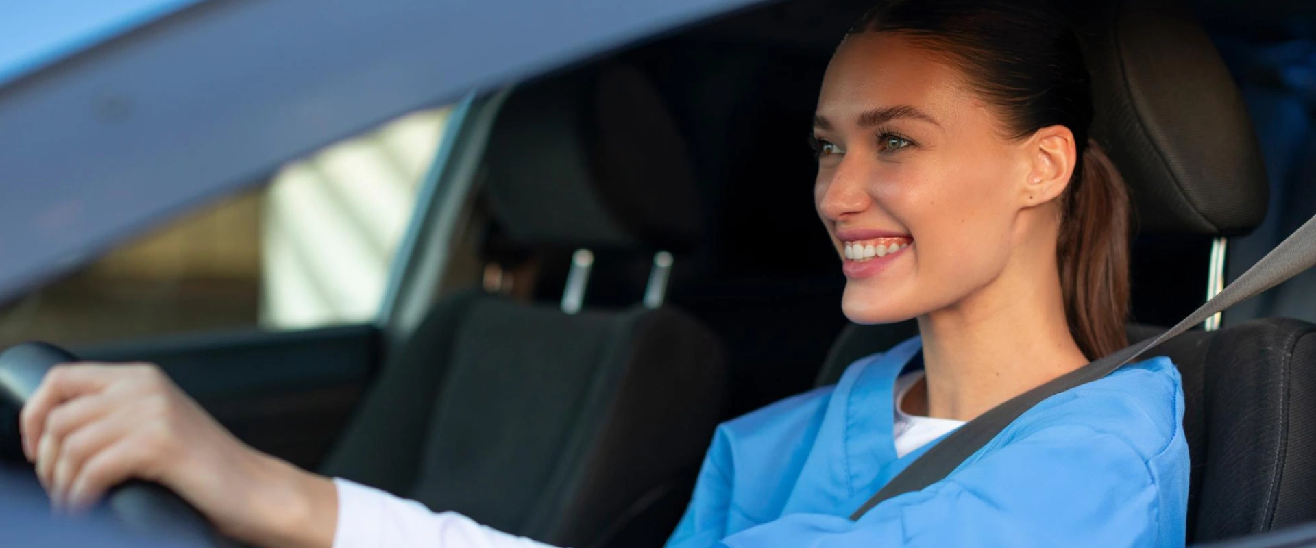 Thrive On Care offers safe transportation services as a woman secures her seatbelt.